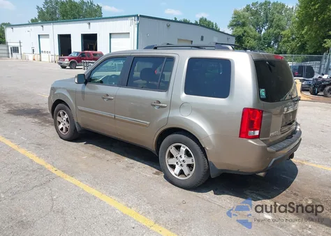 2010 Honda Pilot Touring z USA, uszkodzony, nr VIN 5FNYF4H91AB009014